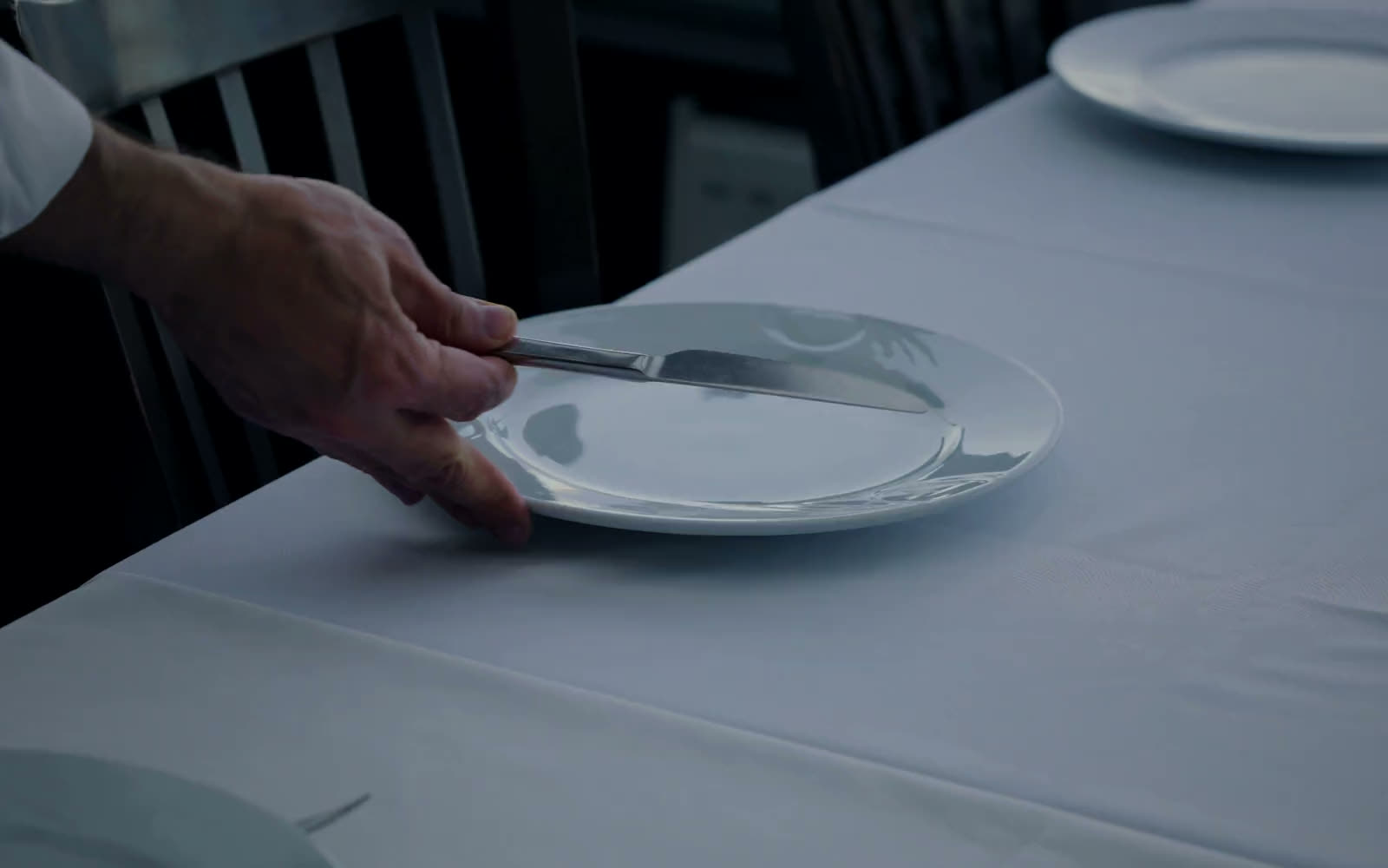 A table being set against the Bosphorus view at Therapia
